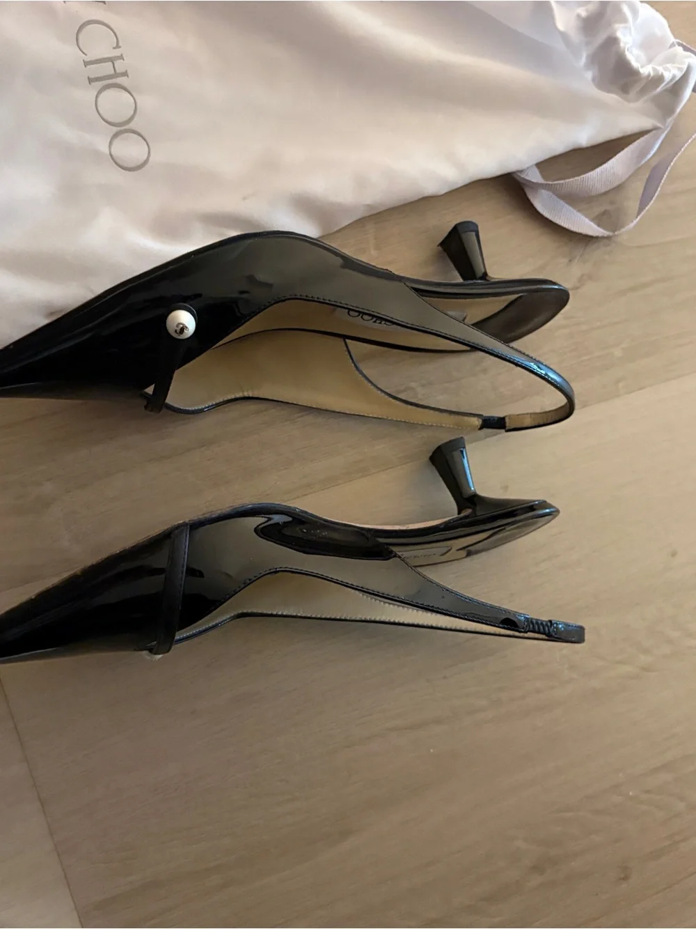 Jimmy Choo Black Patent Leather Pointed Slingback Pumps with Pearl Accent